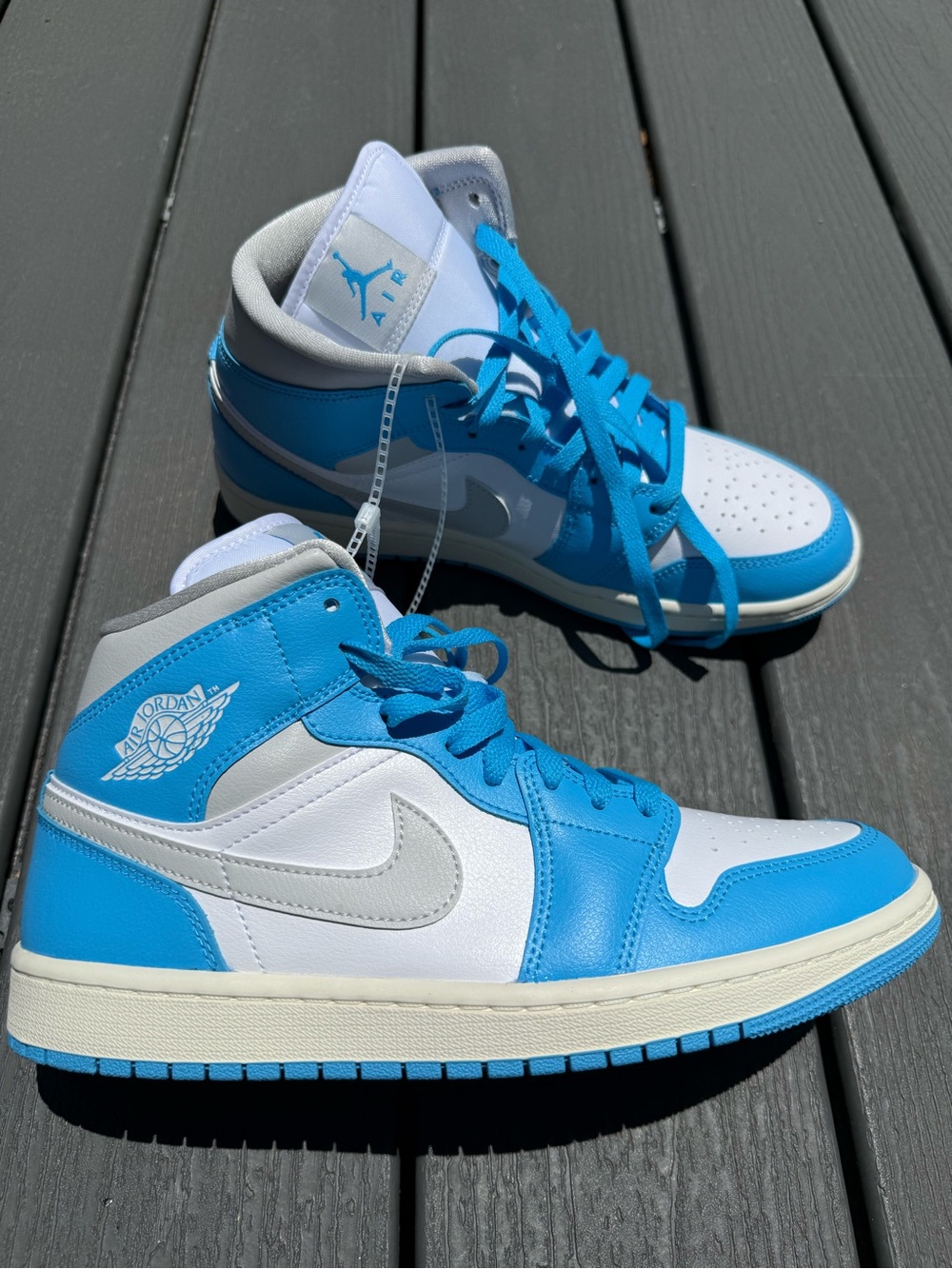 Nike Air Jordan 1 Mid White and University Blue Sneakers